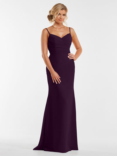 A woman with blonde hair in an elegant updo models Avery Austin's 80169—an ankle-length, sleeveless chiffon gown with thin straps, a pleated bodice, and a deep purple hue—posed before a plain white background.