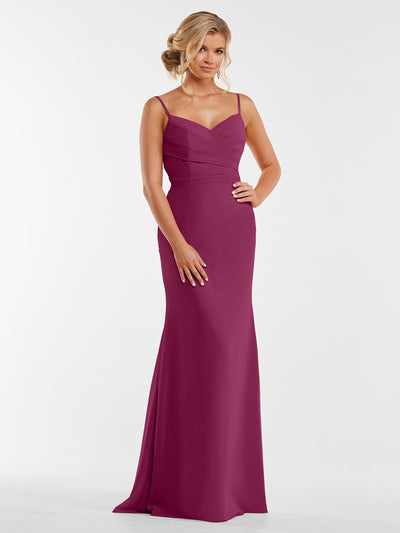 A woman models Avery Austin's 80169: a floor-length magenta chiffon dress with thin straps and a pleated bodice, standing against a plain white background.