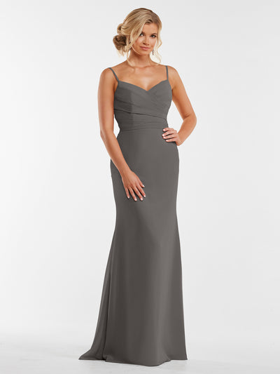 A woman with blonde hair in an elegant updo models Avery Austin's floor-length chiffon dress 80169, featuring a slate gray hue, thin straps, and a fitted pleated bodice, against a plain white background.