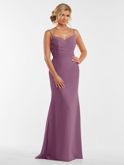 A woman models Avery Austin's 80169: a floor-length mauve chiffon dress with thin straps, sleeveless design, and a fitted, pleated bodice, set against a plain white background.