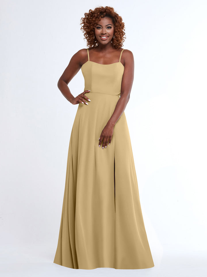 A woman with curly hair smiles in Avery Austin&