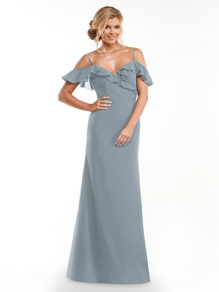 A woman wearing Avery Austin’s 80172, an A-line dress with off-the-shoulder sleeves and a ruffled neckline.