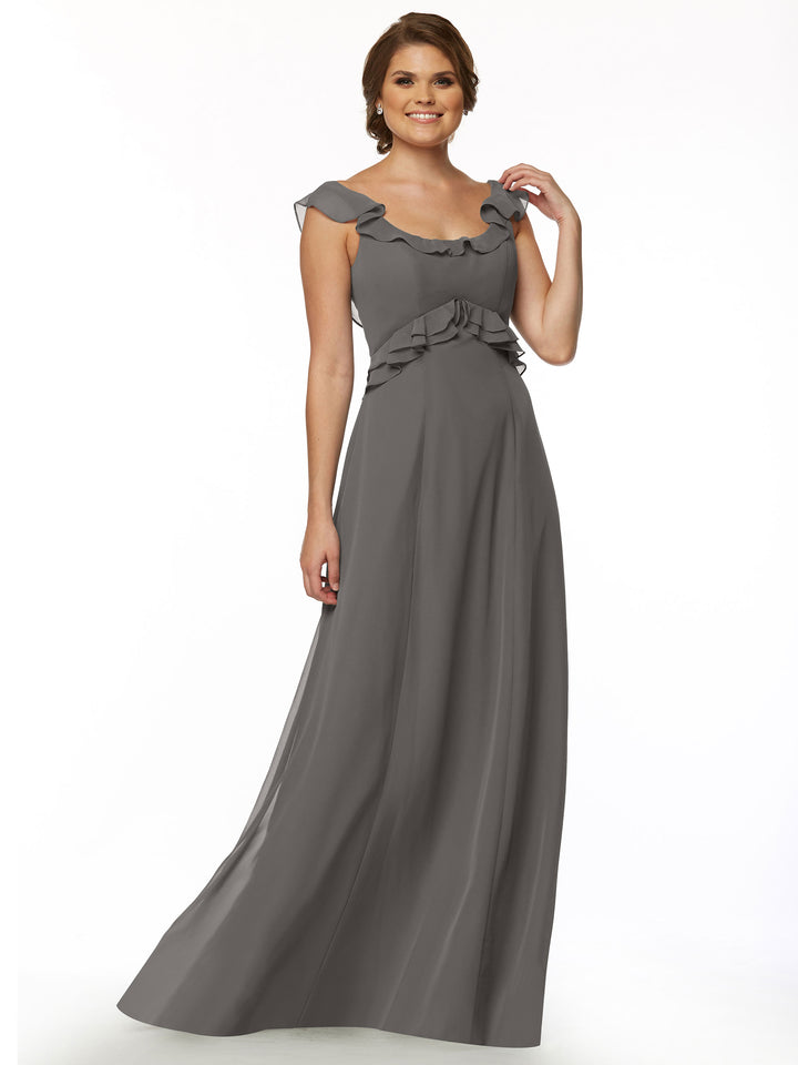 A woman smiles in the Avery Austin TH-80173: a sleeveless, floor-length gray gown with ruffled neckline and shoulder and waist details, shown against a plain white background.