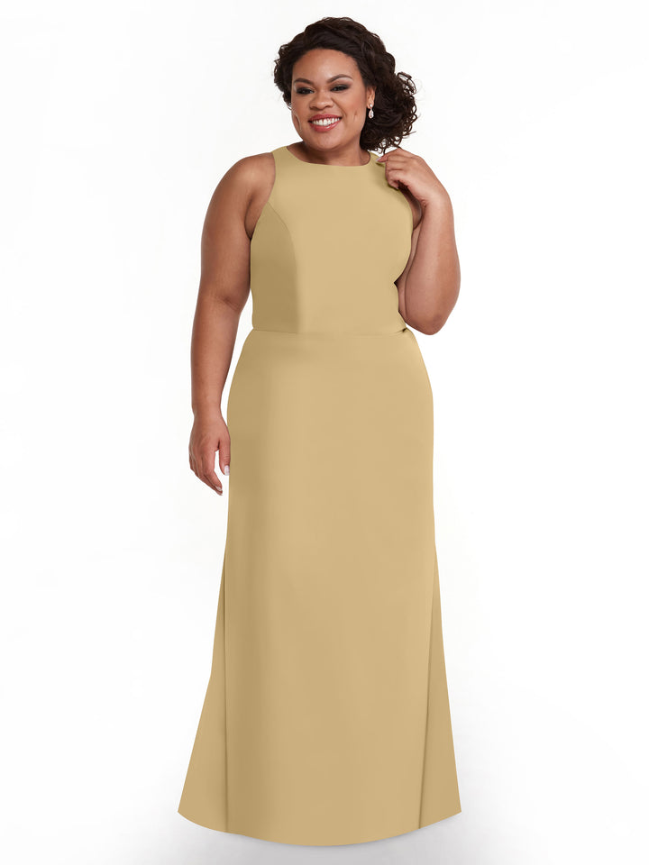 A woman with curly hair smiles while wearing Avery Austin&