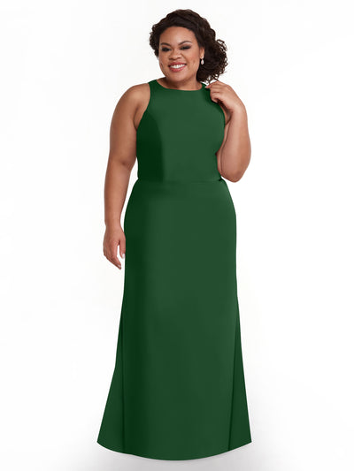 A woman with curly hair wears the Avery Austin 80175, a sleeveless, floor-length dark green A-line dress with a keyhole back. She is smiling and standing against a plain white background.