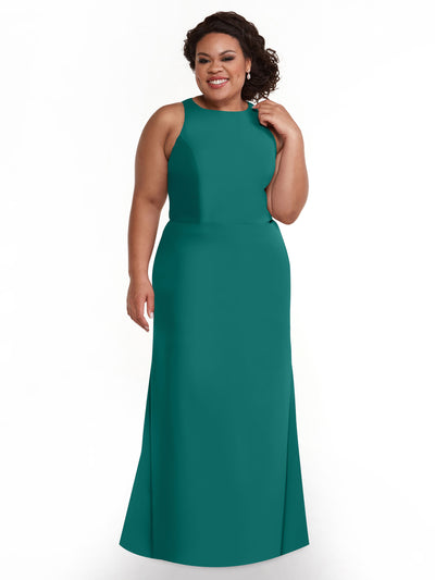 A woman with curly hair smiles while wearing Avery Austin’s 80175, a sleeveless, floor-length teal A-Line dress. She stands against a plain white background with her hand touching her hair.