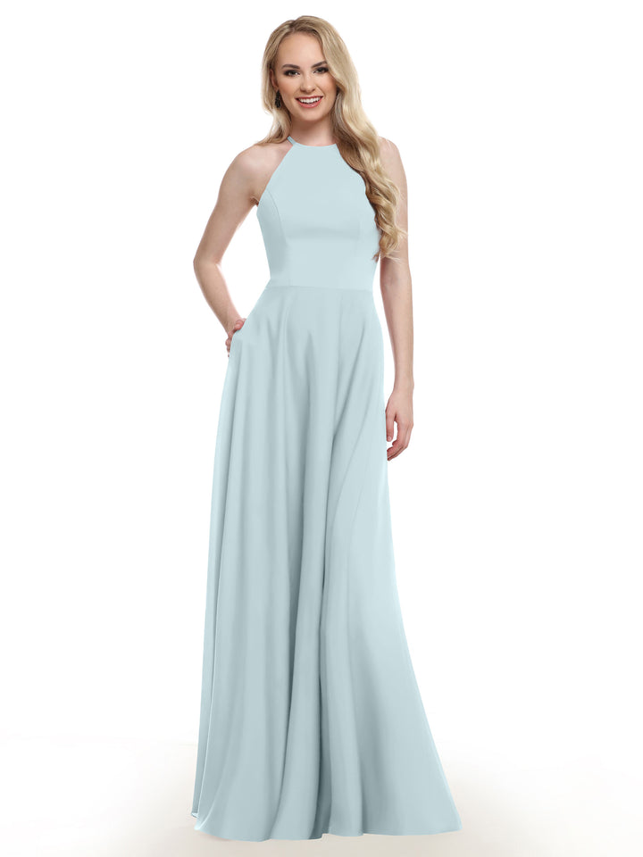A woman with long blonde hair smiles against a white background, wearing the Avery Austin TH-83022—a light blue, sleeveless, floor-length A-line gown.