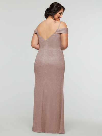 A woman wearing the averyaustin 84002 - Tried On Sample dress showcases its deep V-back and floor-length, shimmering mauve glitter knit skirt. Her hair is styled in a low updo with a decorative pin.