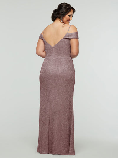 A woman with dark hair in an updo models the averyaustin 84002 - Tried On Sample: a shimmering mauve glitter knit off-the-shoulder dress with a deep V-back, standing against a plain light background, facing away from the camera.