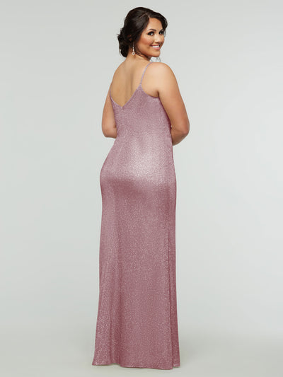 A woman with dark hair in an updo models the averyaustin 84008 - Tried On Sample: a sleeveless, floor-length, shimmery mauve sheath dress. She stands smiling over her shoulder against a plain light gray background.