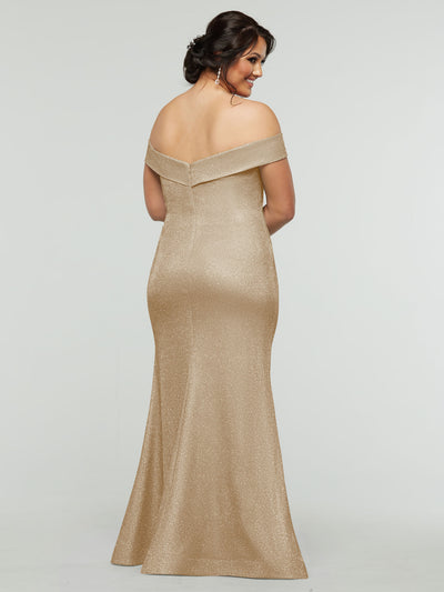 A woman with dark hair in an updo models the averyaustin 84010 - Tried On Sample, an off-the-shoulder, floor-length gold shimmer mermaid dress. She faces away, smiling over her shoulder against a plain light background.
